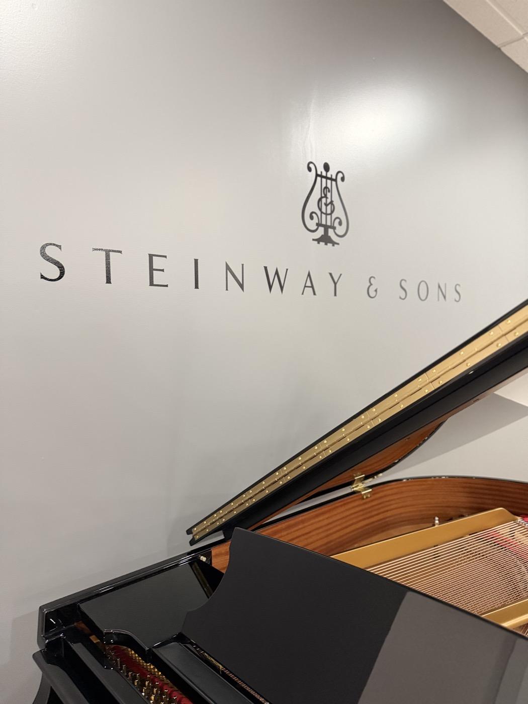A Steinway & Sons grand piano at a performance venue